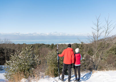 Couple looking over the Dunes after a day cross country skiing